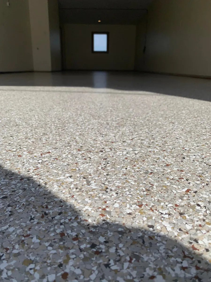 Concrete coating with flake finish in garage