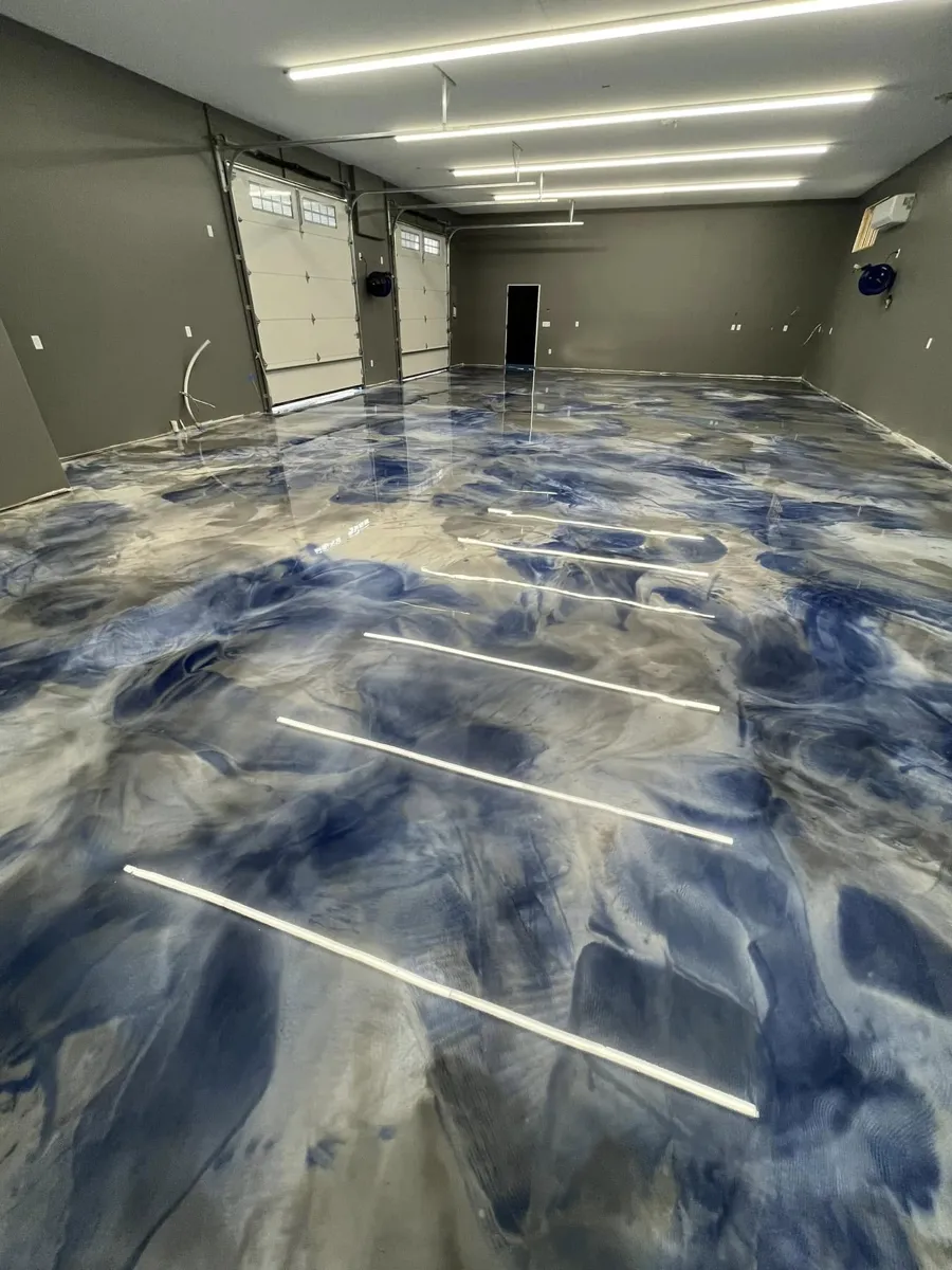 Blue metallic epoxy garage floor by Jakes Floor Care